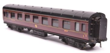 An Exley O gauge LMS corridor coach. Full First in maroon livery. QGC-GC, chipping and minor over-