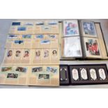 A quantity of cigarette cards and postcards. Including 8x cigarette card booklets including;