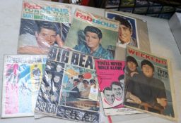 A quantity of Rock music memorabilia, mostly Beatles related. Including vintage publications,