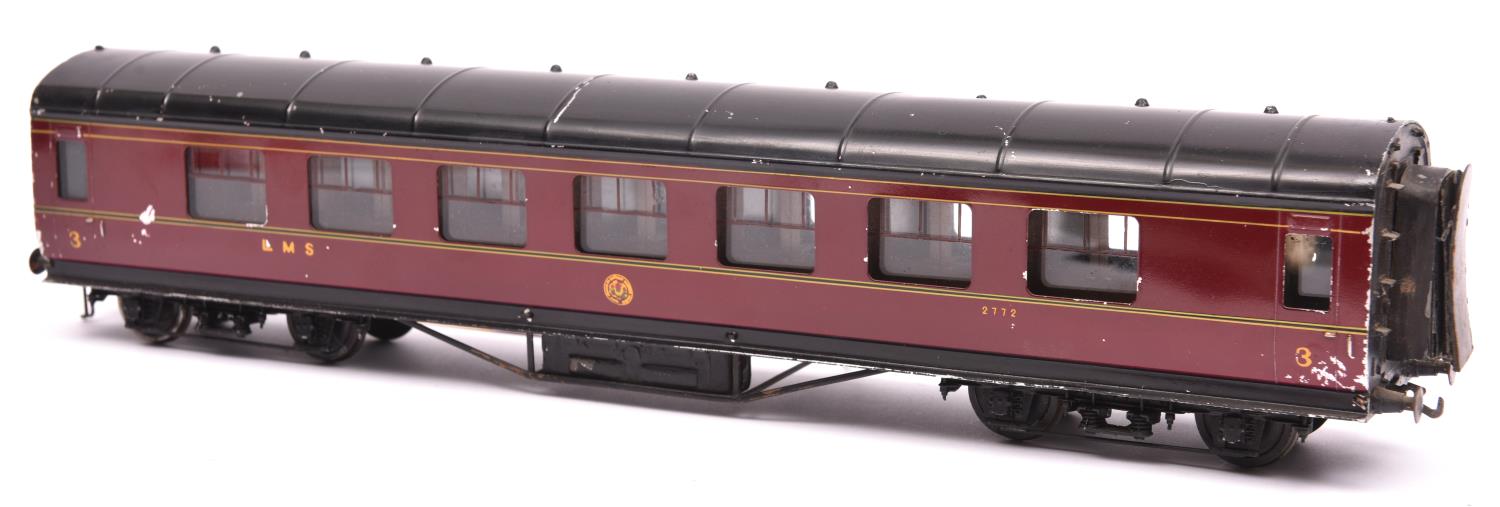 An Exley O gauge K5 LMS corridor coach. Full Third in maroon livery. With Exley label to base. QGC-