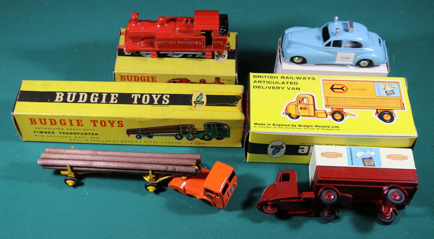 4 Budgie Toys. Articulated Heavy Duty Timber Transporter (230) in orange and yellow livery, with BRS