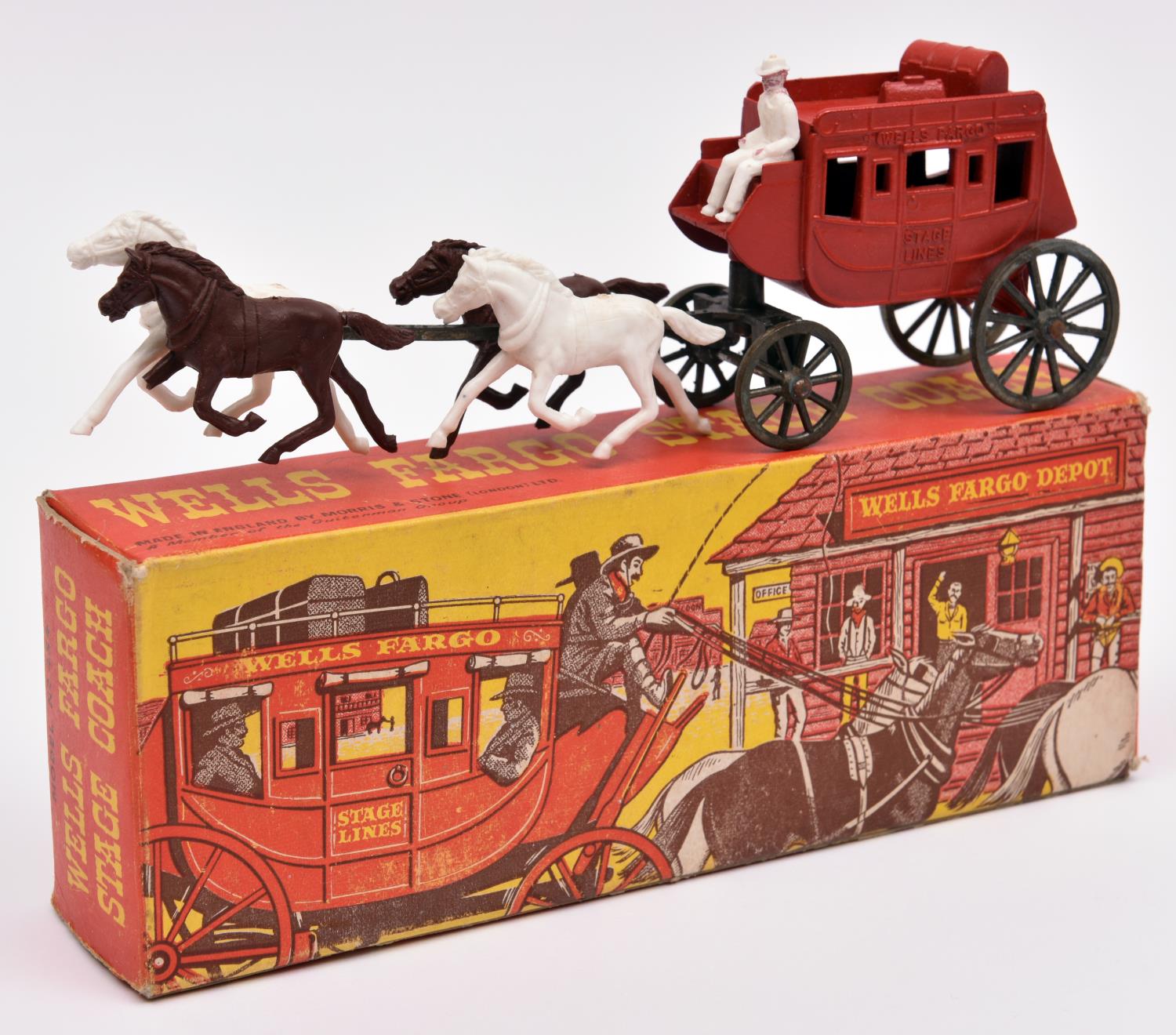 A Morris & Stone (London) Ltd. (Morestone) Wells Fargo Stage Coach. In red with unpainted wheels,