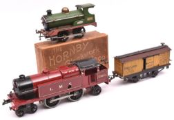 3x Hornby O gauge items. A boxed No.1 clockwork LNER 0-4-0 tender locomotive, 2710, in green with