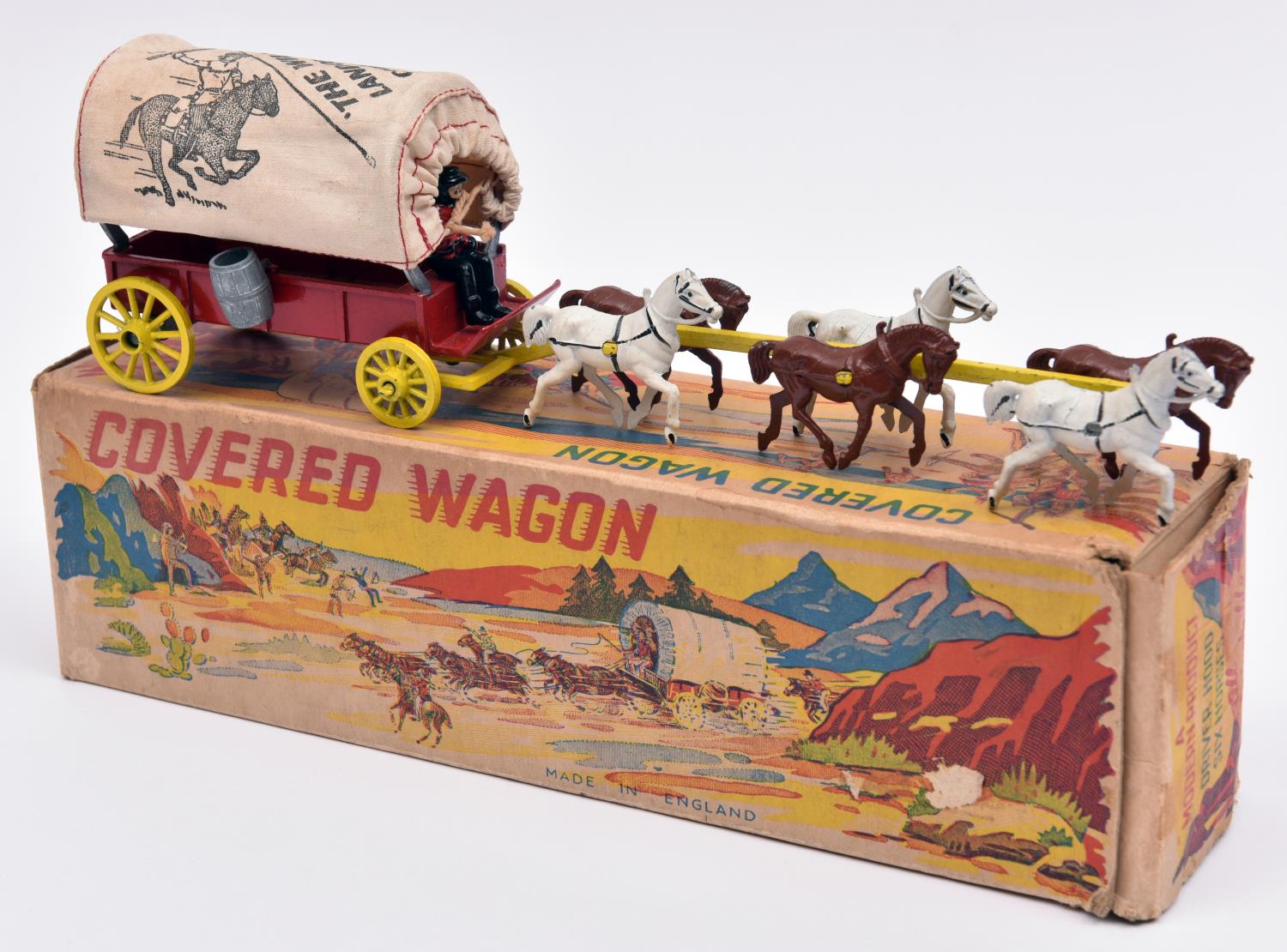 A Modern Products Covered Wagon. In red with yellow wheels, six horses, pictured tilt, red painted