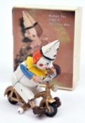 A rare Budgie Toys Clown on Bike (301/2). In white with yellow ruff, blue arms, orange hair and