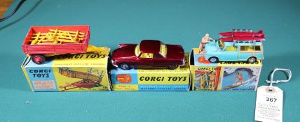 3x Corgi Toys. A Citroen DS 'Le Dandy' Coupe (259) in metallic dark red. BMC Countryman with surf