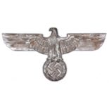 A large Third Reich silvered cast iron wall eagle, span 26½", with 4 threaded mounting bosses to the