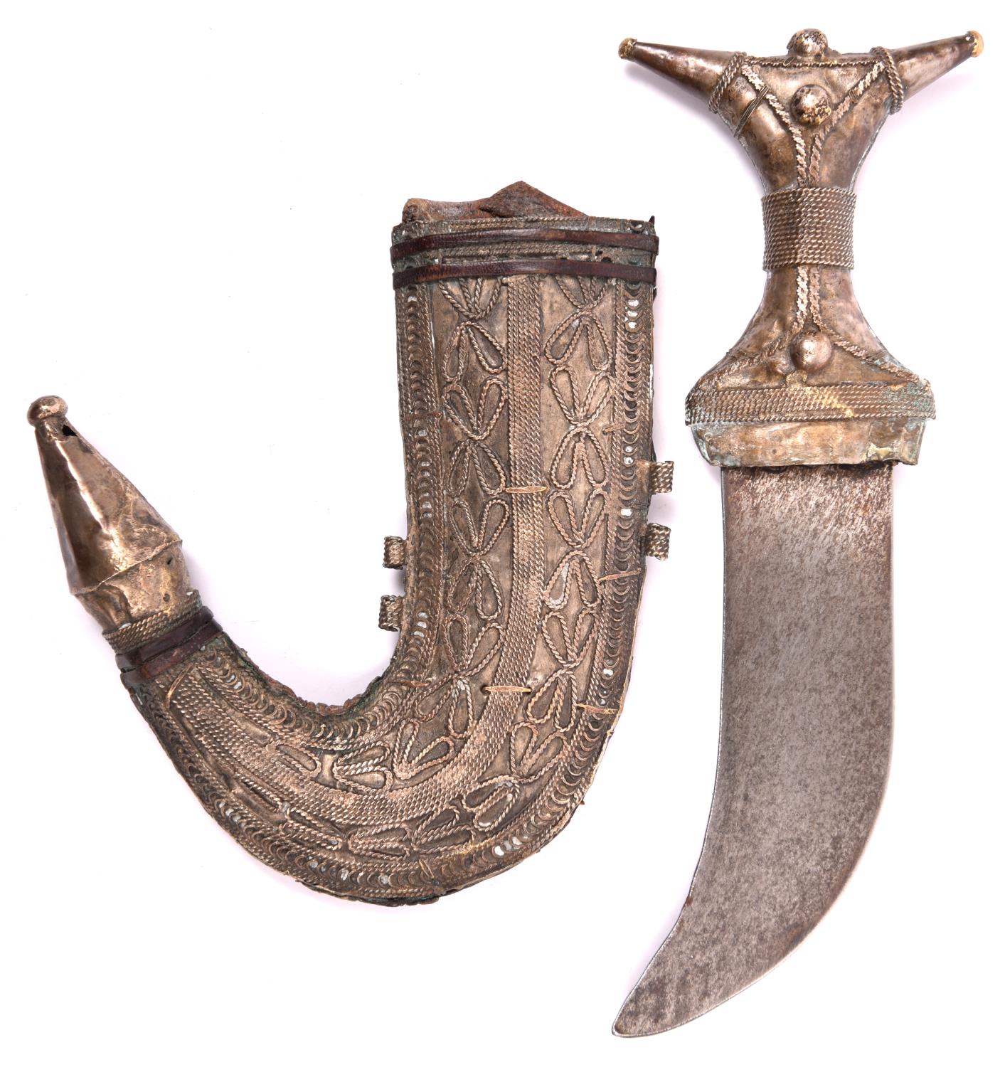 An Arab child's jambiya, flat blade 4", the hilt and sheath of white metal with filigree