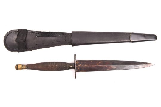 A Second pattern FS fighting knife, with darkened blade, steel crossguard and darkened brass hilt, - Image 2 of 2