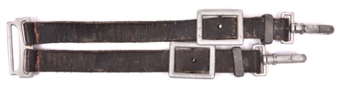 A scarce set of Third Reich RAD dagger straps, of leather with aluminium fittings. GC (the leather