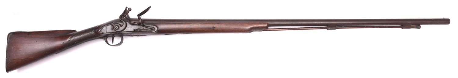 A late 18th century 10 bore flintlock fowling piece, by Hunt of Colchester, barrel 42" with London