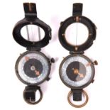 A prismatic marching compass, the back marked with broad arrow over "F-L" and dated 1918; and