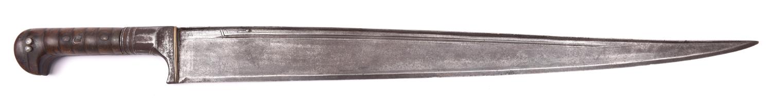 A large Afghan Khyber knife, blade 21", the iron mounted hilt having horn grips. Basically GC (metal