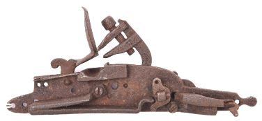 A rare detached lock from an early 17th century English flintlock musket, originally made as
