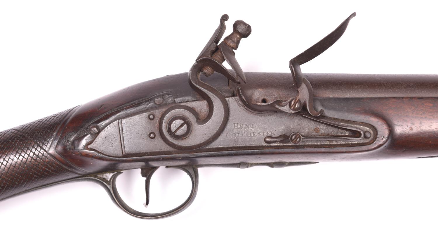 A late 18th century 10 bore flintlock fowling piece, by Hunt of Colchester, barrel 42" with London - Image 2 of 2