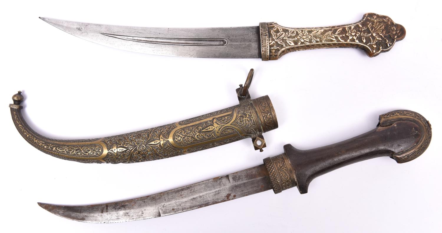A Moroccan jambiya, blade 9", with brass mounted plain wood hilt in its brass sheath with chased - Image 2 of 2