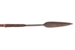 A Zulu spear Assegai, 56" overall, the leaf shaped blade having 5" stem, with plaited rattan bound