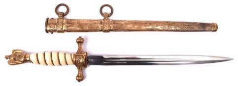 A Third Reich Naval officer's dagger, with plain unmarked blade, in its sheath. GC, retaining much