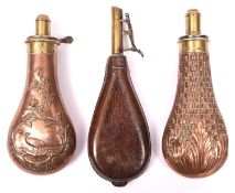An embossed copper gun size powder flask "pheasant in foliate panel" (R741, no rings), with patent