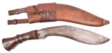 A copy of a WWI military issue kukri, blade 12½" stamped with broad arrow over "I", date 1917,