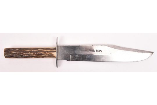 A Bowie knife, clipped back blade 9½", marked in Gothic script "Original Bowie Knife", with oval