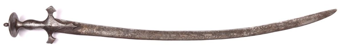 An Indian tulwar, blade 31" crudely etched for its entire length with animals and foliage, the plain