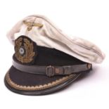 A Third Reich Naval officer's white top peaked cap, with bullion badge and brass eagle, and maker'