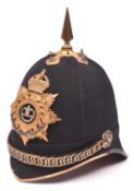 An officer's blue cloth helmet with reproduction post 1902 plate of the Welsh Regiment, GC (minor