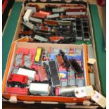 A quantity of Hornby Dublo Railway rolling stock and other items. Including bogie brick wagons,