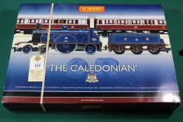 A Hornby OO gauge The Caledonian train pack (R2610). Comprising a Caledonian Railway 4-2-2 tender