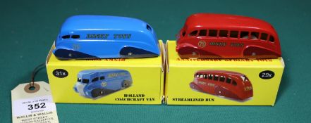 2 MSMC white metal Christmas Club models. Streamlined Bus in red and maroon livery and a Holland