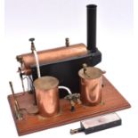 A Stuart Models live steam boiler for a steam plant. A well constructed model in brass etc. Fitted