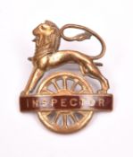 British Railways (Western Region) INSPECTOR cap badge. Brass and brown enamel lion over wheel,