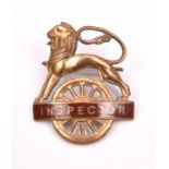 British Railways (Western Region) INSPECTOR cap badge. Brass and brown enamel lion over wheel,