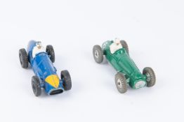 2 scarce Dinky Toys Racing Cars. A Ferrari (234) in blue with yellow triangle to nose and black cast