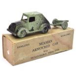 A Kemlow Product, modern Armoured Car finished in green and black, with Detachable Field Gun. boxed,