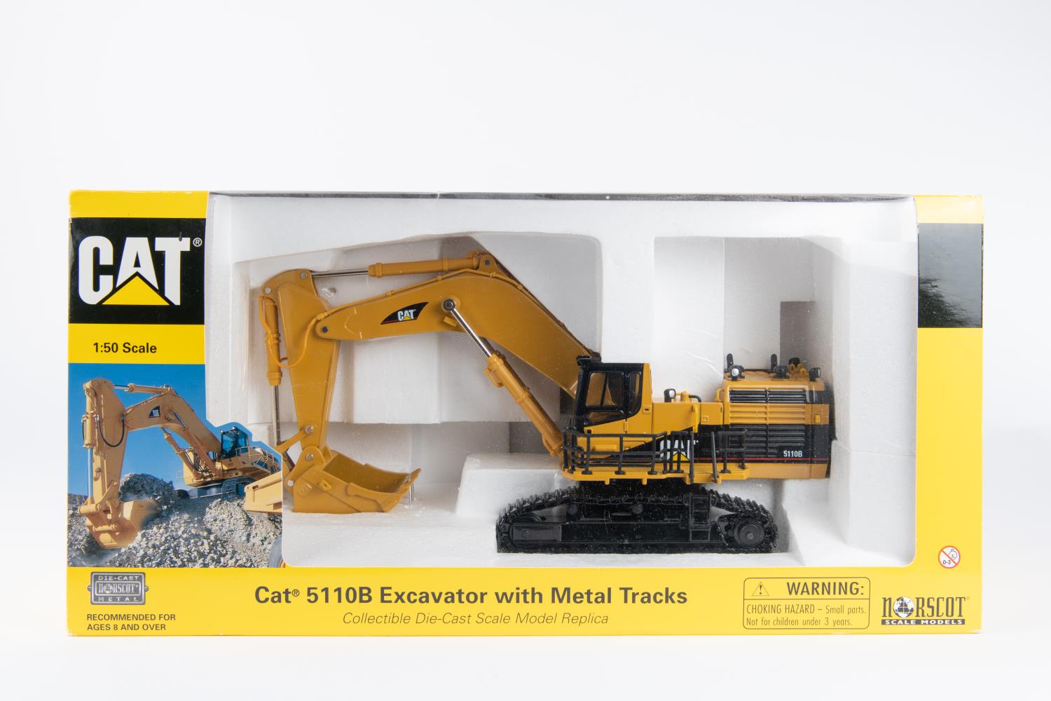 Norscot 1:50 scale Cat 5110B. Excavator with Metal Tracks. In yellow and black livery. Boxed,