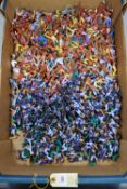 60+ Timpo plastic indian figures with various coloured trousers, several cowboys in various colour