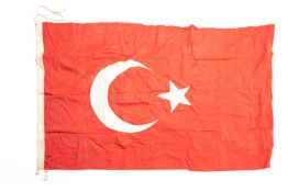 A WWI Turkish flag, 55" x 34", stitched construction, GC £65-70