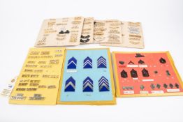 2 cards of US Army rank badges, also approximately 100 anodised aluminium British Army shoulder