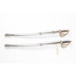 Two modern Indian small military pattern swords, slightly curved blades 22½" stamped at the