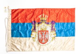 A WWI Serbian flag, 36" x 22", printed with coat of arms centre motif. GC £65-70