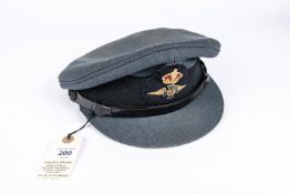 A pre 1953 RAF Chaplain's peaked cap, metal badge with gilt crown, with maker's stamp of Bates, St