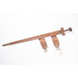 A Tuareg sword, tapered DE blade 31½", etched with scrolled decoration, cruciform hilt with