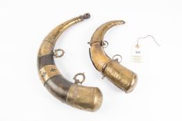 Two Moroccan tourist quality brass mounted horn powder flasks, 11" an 14" overall. GC (some damage