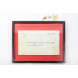 A Third Reich framed Christmas invitation from the Fuhrer, dated December 1943, framed and