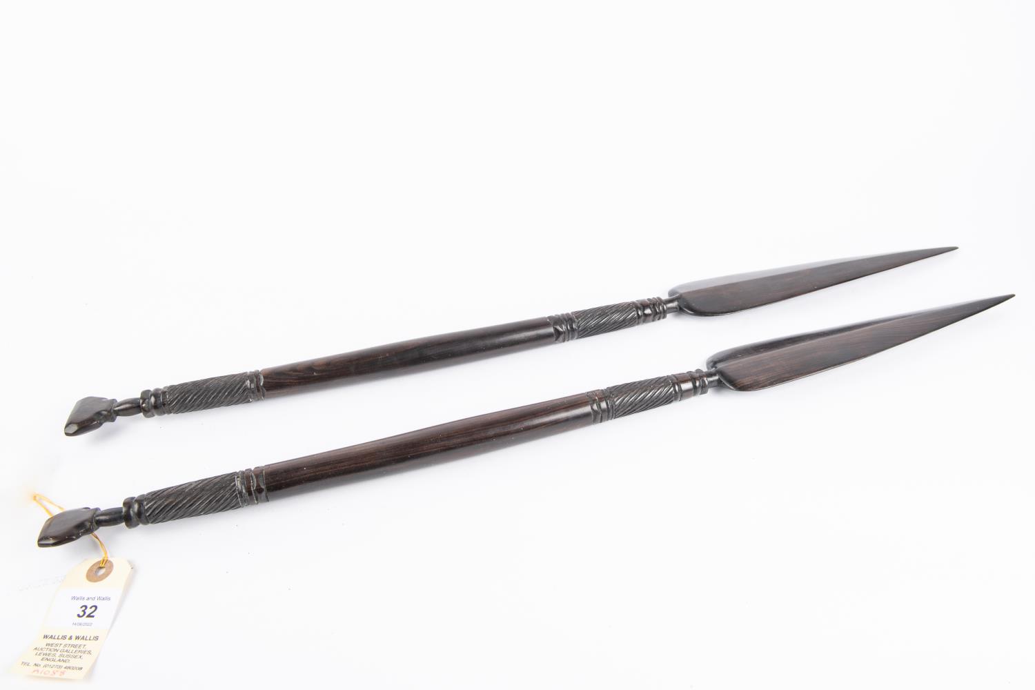 A pair of decorative African short ebony spears, 26" overall, with bands of spirally fluted - Image 2 of 2