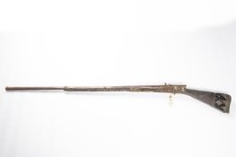 A once good 18th century Turkish miquelet flintlock gun, barrel 42" with some floral engraving at
