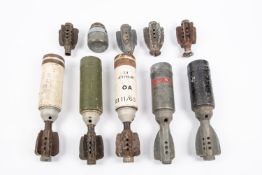 5 WWII etc 2" mortar bombs, all minus detonator fuse front section; also some components. GC £30-