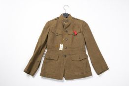 A good WWI US Army khaki service dress jacket, with bronzed buttons and medical collar badges,